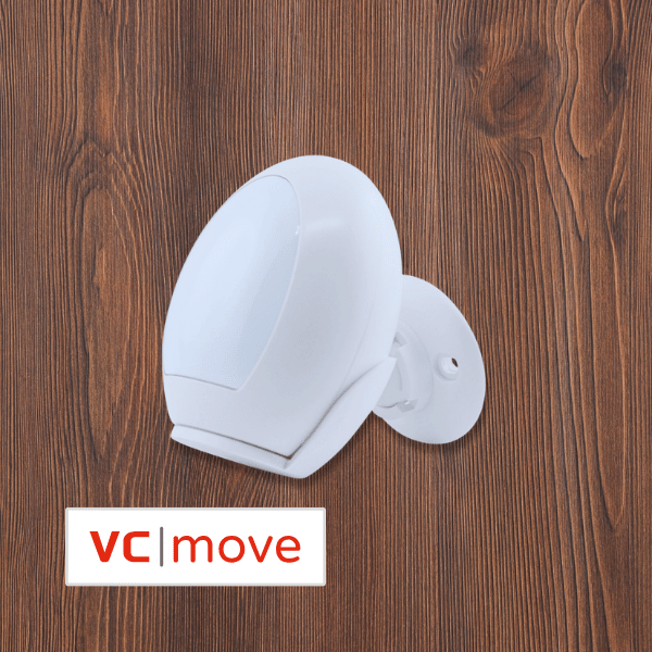 vc|move Bewegungsmelder an einer Holzwand im Wohnmobil